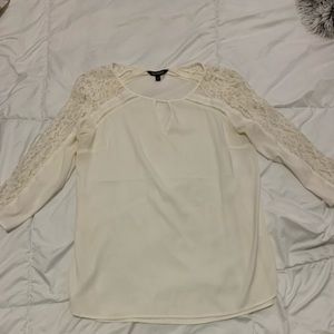 Mid length lace blouse with neck cut out